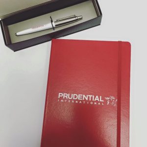 Hard cover branded notebook with elastic bookmark